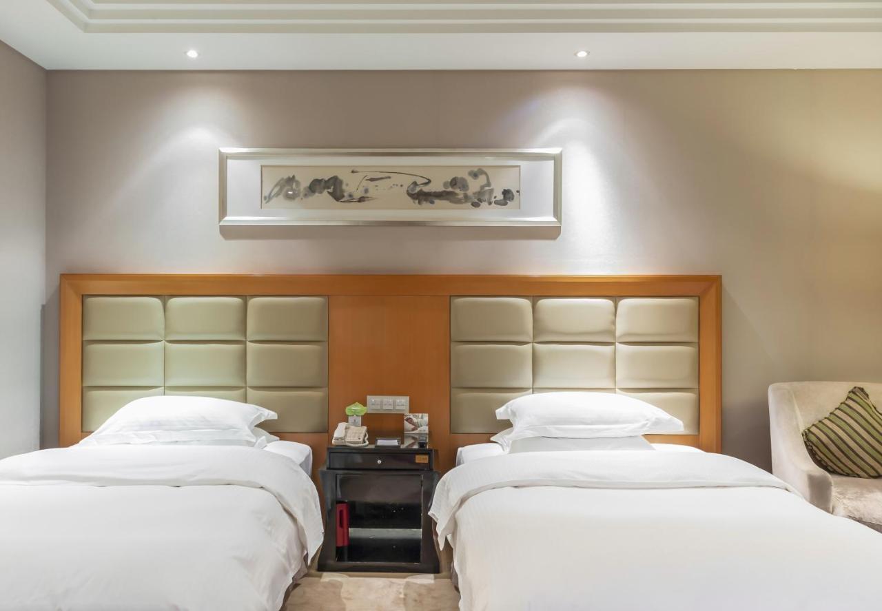 Wyndham Xinyang Downtown Hotel Eksteriør billede