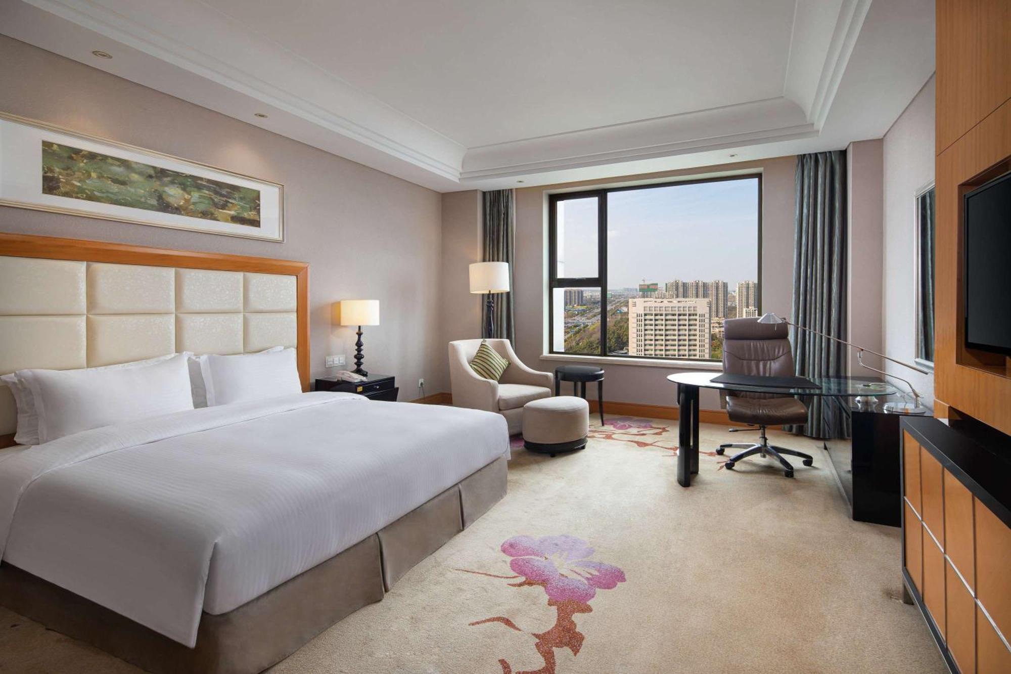 Wyndham Xinyang Downtown Hotel Eksteriør billede